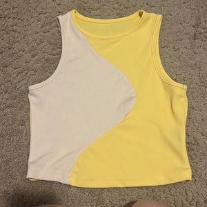 split yellow and cream colored cropped tank top! size medium